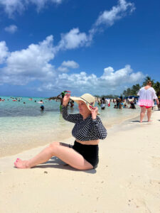 Digital photo restoration. Sunbather on crowded beach